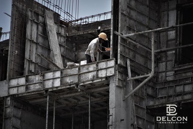 Site engineer on formwork during commercial building construction