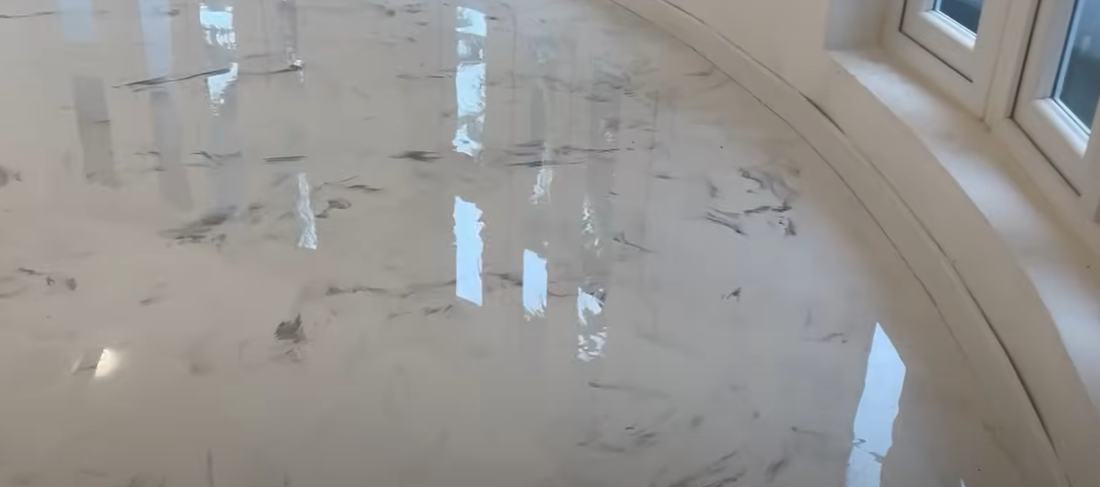 Finished glossy marbled epoxy floor in a room